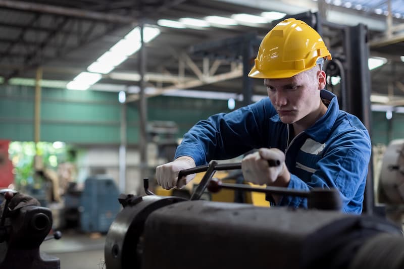 engineering worker doing maintenance in a factory